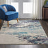 2' X 4' Ivory And Teal Blue Abstract Power Loom Non Skid Area Rug